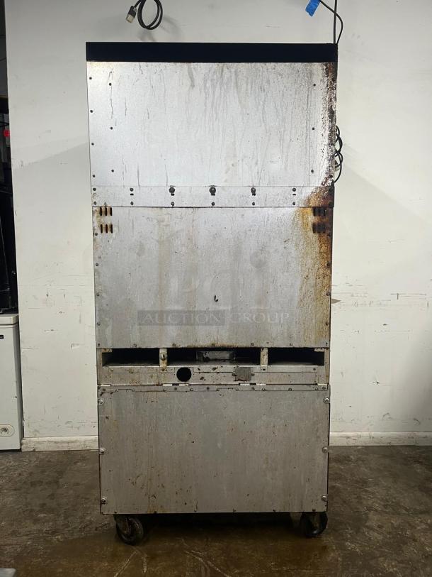 Vulcan VIR1F_NAT 36" gas broiler, deck-type, single infrared burner, 100000 BTU, visible wear, on wheels, industrial use.