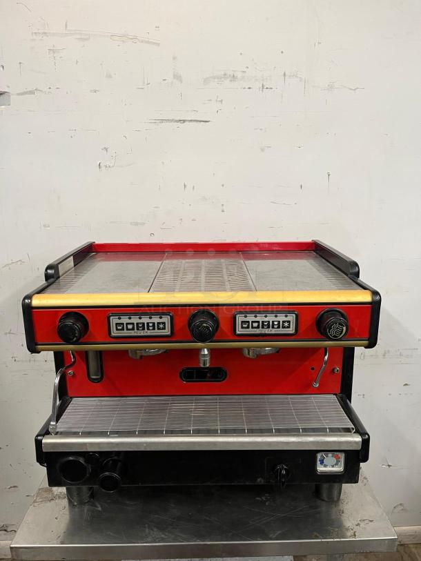 LA SPAZIALE NEW EK 2-group commercial espresso machine, vibrant red and black, dual spout, controls visible, used condition.