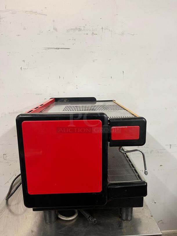 LA SPAZIALE NEW EK 2-group commercial espresso machine in red and black, showing drip tray and steam wand, good condition.