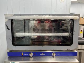 ROCKET ENCOV-38 countertop convection oven, full size, glass door, 208/204V, excellent condition, control dials visible.
