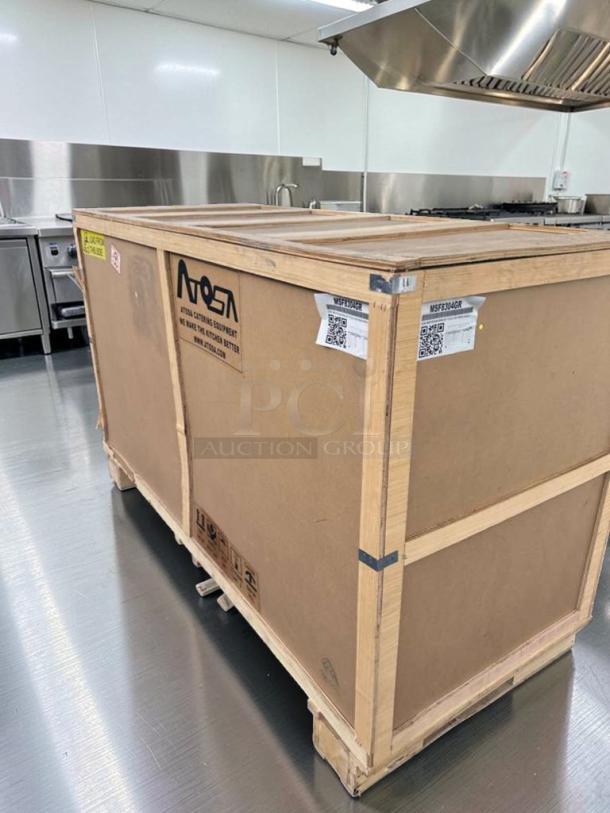 Crated Atosa MSF8304GR 3-Door Mega Top Sandwich Prep Table Refrigerator, brand new, stainless steel, ETL & NSF listed.