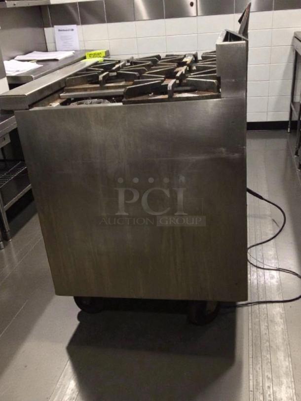Jade JTRH-6-36C commercial gas range, 36 inches, stainless steel, fully tested, excellent condition, with six burners.