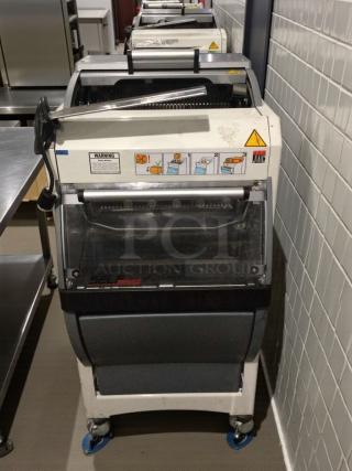 JAC KG-12FS commercial bread slicer, refined condition, fully tested, 115V, single phase, warning labels visible.