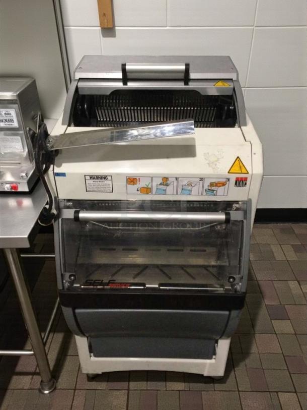 JAC KG-12FS commercial bread slicer, 115V, single phase, refined condition, fully tested. Safety and operation labels visible.