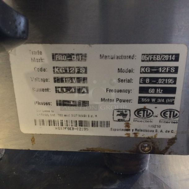 JAC KG-12FS commercial bread slicer label showing 115V, 1.4A, 60Hz, and 559W power details, manufactured on 05/FEB/2014.