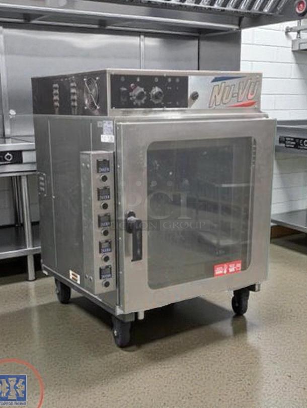 Nu-Vu RM-5T countertop convection oven with mobile stand, stainless steel, outstanding condition, 208V/3 Phase, Nu-Vu branding visible.