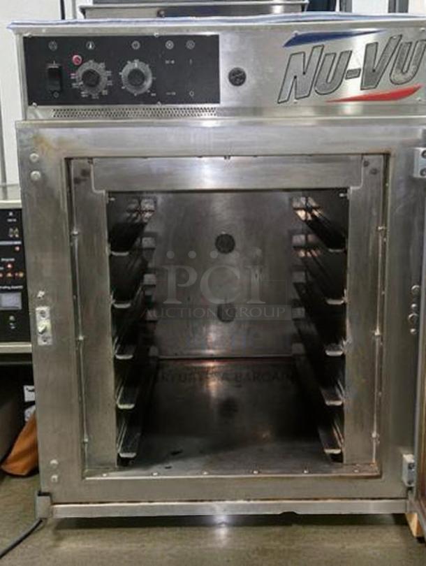 Outstanding condition Nu-Vu RM-5T single-deck countertop convection oven with mobile stand, 208V/3 phase. Fully tested & working.