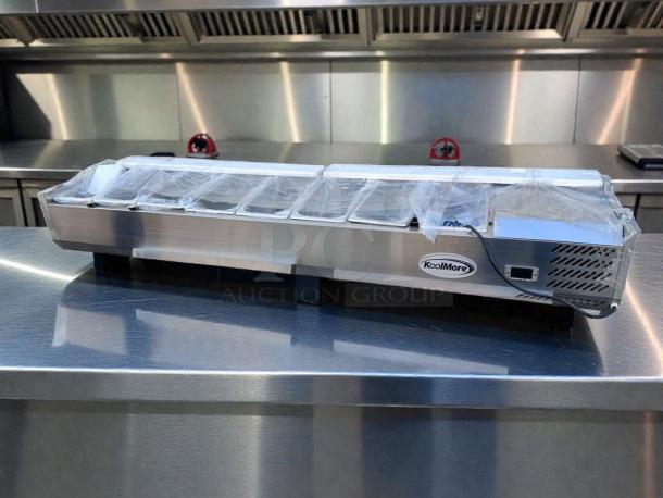 Brand new KoolMore SCDC-8P-SG refrigerated prep rail, 8-pan capacity, glass sneeze guard, UL listed, never used.