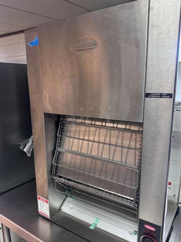 Hatco TK-100 commercial conveyor toaster, stainless steel, UL & NSF listed, excellent condition, model label visible.