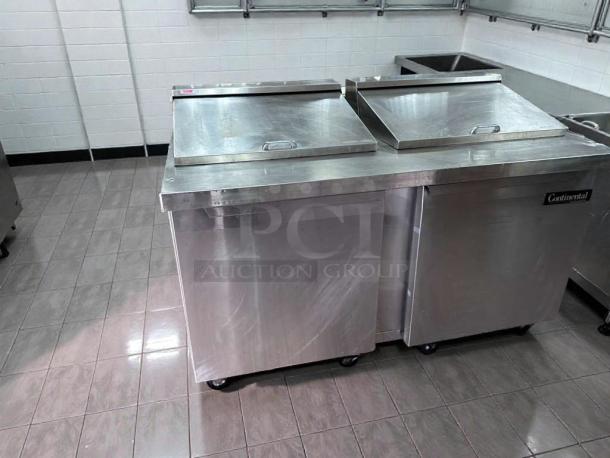 Stainless steel Continental commercial refrigerated prep table, excellent condition, labeled NSF & UL listed, fully operational.