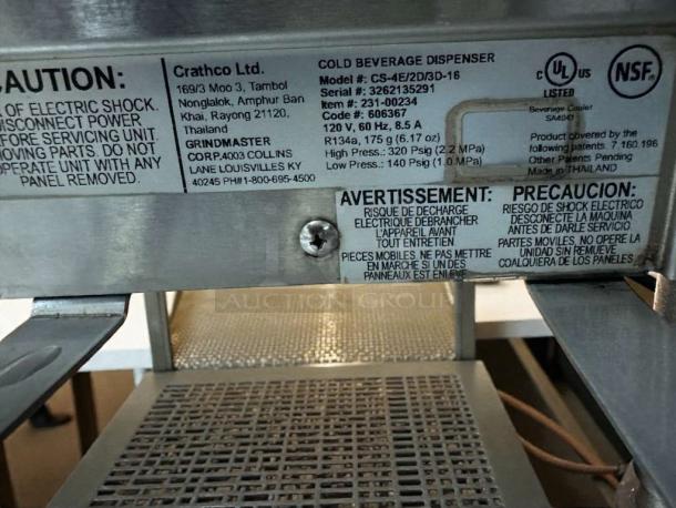 Crathco CS-4E/2D/3D-16 cold beverage dispenser tag displaying model, UL, NSF listings, and caution warnings.