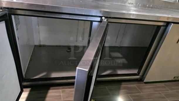 True TPP-93 Commercial Pizza Prep Refrigerator, 93" three-door, open view, superior condition, UL listed, 115V.