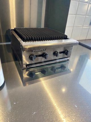 Commercial stainless steel 4-burner gas charbroiler in outstanding condition, natural gas, fully tested, model CHAR-M-GAS-0543.