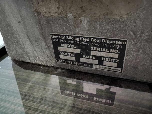 General Slicing/Red Goat Commercial Vegetable Slicer label, showing model and serial number fields, NSF certified.