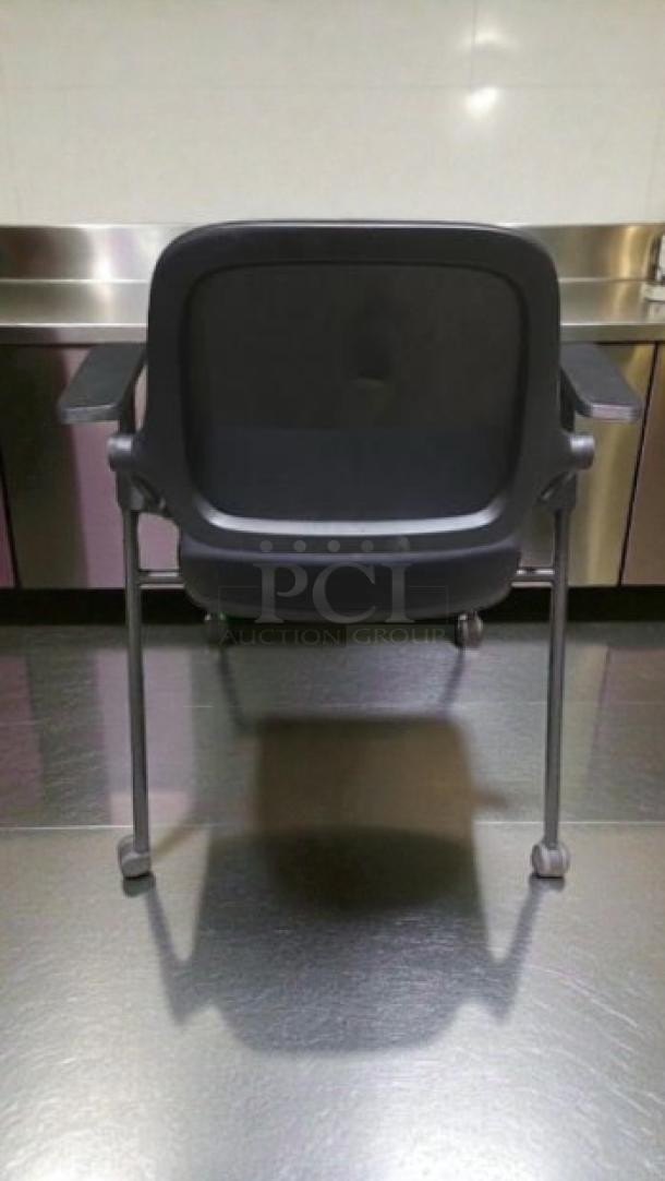 Commercial Institutional Furniture stackable training chair with arms, sled base. Fully inspected, ready for use.