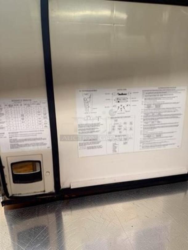 Manitowoc Commercial Ice Maker with Bin, stainless steel, featuring high-volume ice production. Includes visible operational and maintenance instructions. Model: MAN-L-ICE-0780.