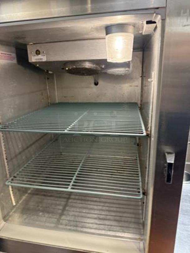 Continental D1RFESNSAHD reach-in refrigerator/freezer, stainless steel, dual temp, immaculate condition, interior view.