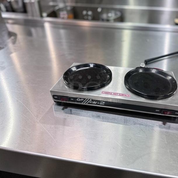 Curtis AW-2-10 two burner coffee decanter warmer in stainless steel. Remarkable condition, fully operational, 120V, labeled "careful hot surface."