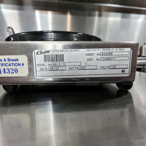 Curtis AW-2-10 Coffee Warmer, stainless steel, two burners, 120V, model label showing Asset No. 943068, tested operational.