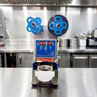 Exceptional condition Y-Fang ET-99SU cup sealing machine, 90-98mm, automatic, UL listed, fully tested, operational.