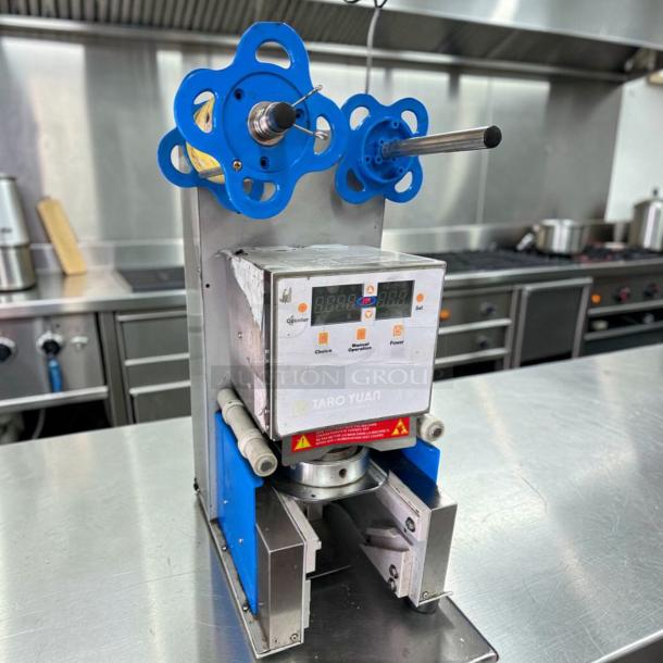 Exceptional condition Y-Fang ET-99SU cup sealing machine, 90–98mm, automatic, UL listed, fully tested, operational.