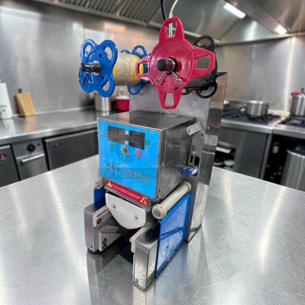 Y-Fang ET-999SN automatic tabletop cup sealing machine in stainless steel, outstanding condition, fully tested and operational.