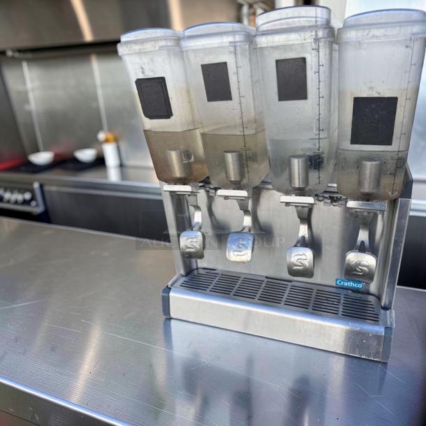 Crathco CS-4E-16-290 refrigerated drink dispenser, 4-bowl system, excellent condition, 120V, tested, commercial use.