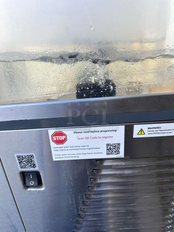 Crathco CS-4E-16-290 refrigerated drink dispenser, 4 bowls, stainless steel, visible QR code for warranty registration, superior condition.