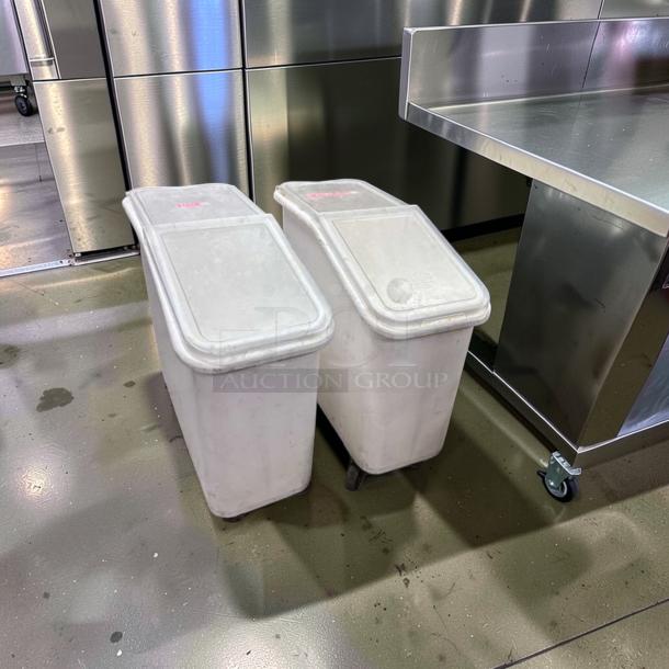 Two Cambro IBS20148 mobile ingredient storage bins, 21 gallons, slant top, in excellent condition, for commercial use.