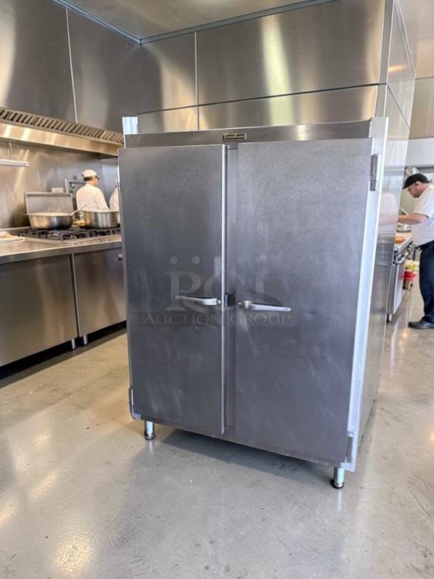 Traulsen G20010 commercial reach-in refrigerator, 52" double door, stainless steel, prime condition, tested, heavy duty.