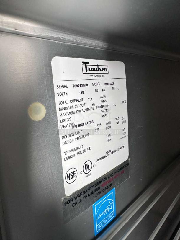 Traulsen G20010 commercial refrigerator label, showing serial number T8976G08, NSF and UL certifications, and energy details.