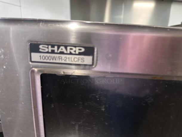 Sharp R-21LCFS commercial microwave, 1000W, stainless steel, UL listed, excellent condition, model tag visible.