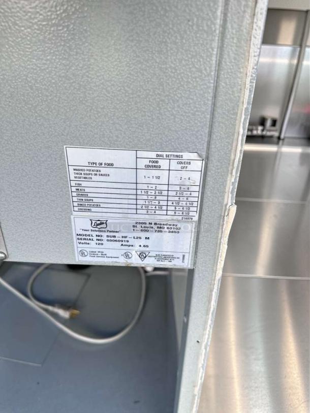 Duke SUB-HF-L25M heated food table, premium condition, with glass sneezeguard. Model details and settings label visible.