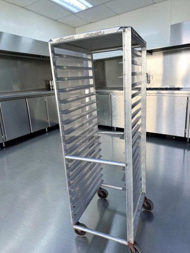 Commercial Grade aluminum sheet pan rack, model ALU-M-RCK-0575, holds 20 pans, heavy-duty with casters, premium condition.