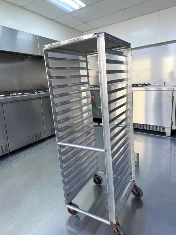 Commercial-grade full-size sheet pan rack with 20 pan capacity, aluminum construction, heavy-duty casters, premium condition.