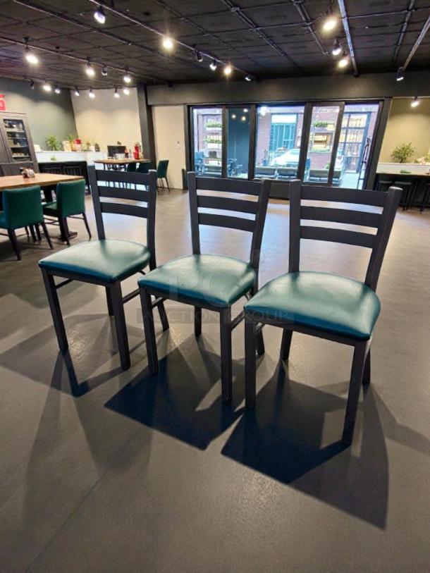 Three commercial restaurant dining chairs with upholstered seats, heavy-duty construction, excellent condition.