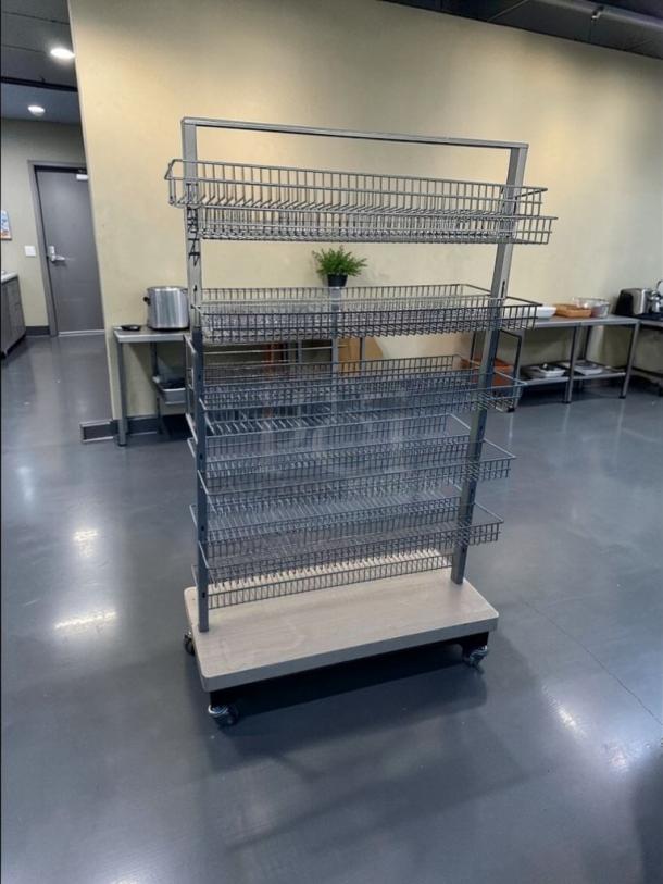 Commercial rolling wire display rack, multi-tier shelving, heavy-duty construction, inspected, ready for use. Model RET-S-RACK-0581.