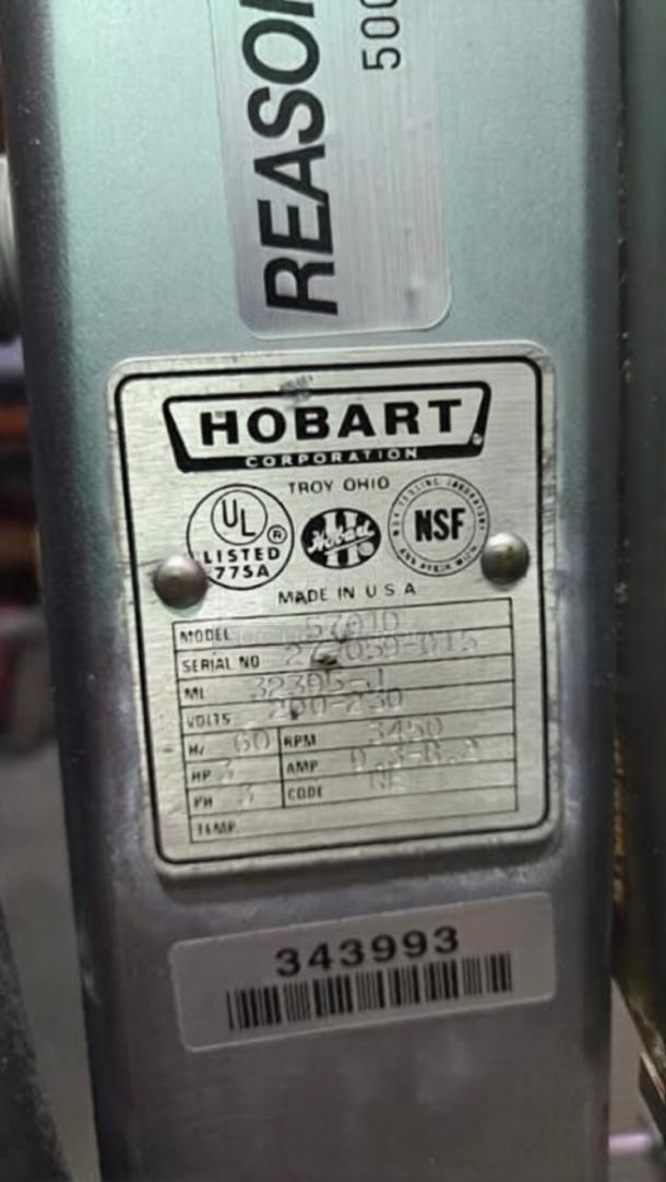 Label on Hobart 5701D commercial meat saw, showing UL and NSF listings, serial number, and specifications.