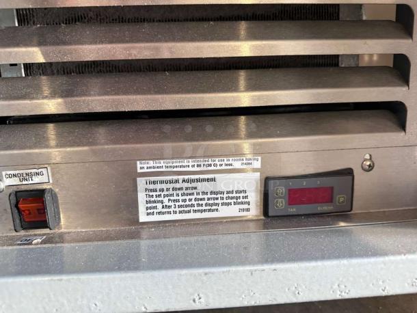 Duke Sub-CP-TC48M refrigerated prep table, excellent condition, thermostat controls, model label visible.