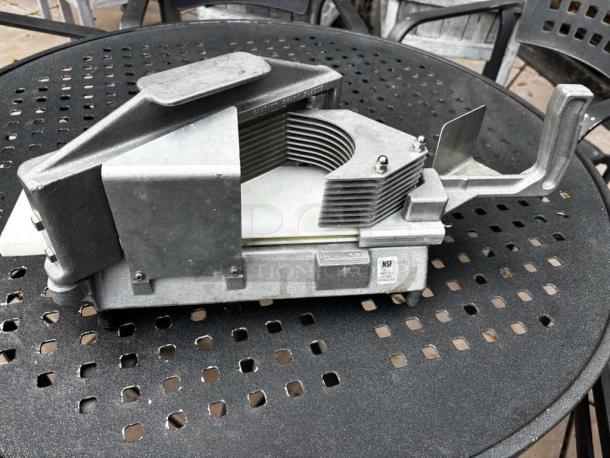 Nemco commercial tomato slicer, superior condition, heavy-duty design, NSF listed, ready for kitchen use.
