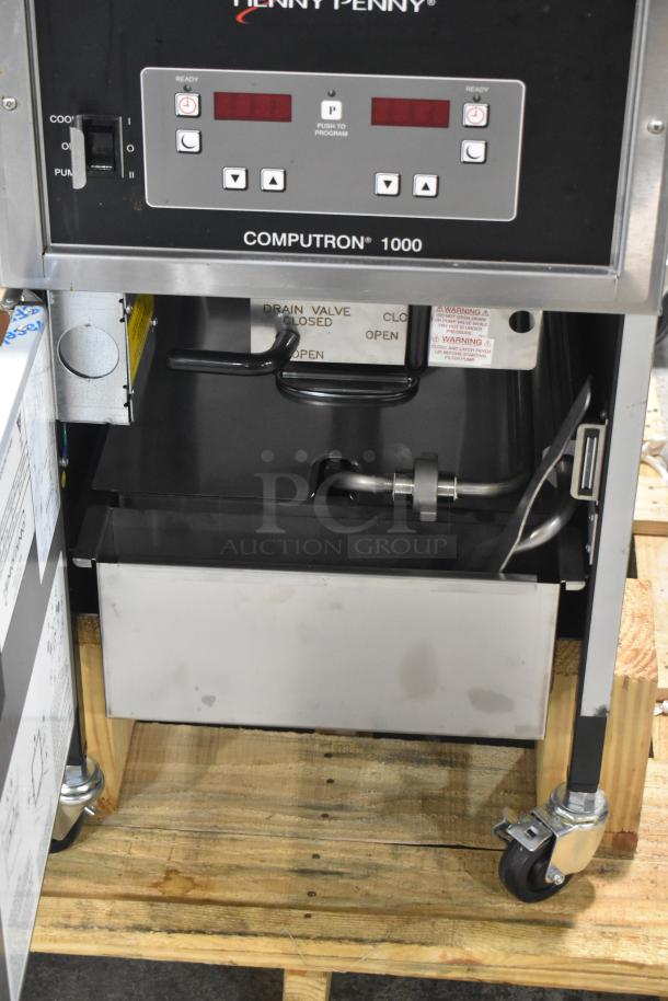 BRAND NEW 2026 Henny Penny 500 Electric Pressure Fryer, scratch and dent, on casters, 220-240V, 1 Phase, visible control panel.