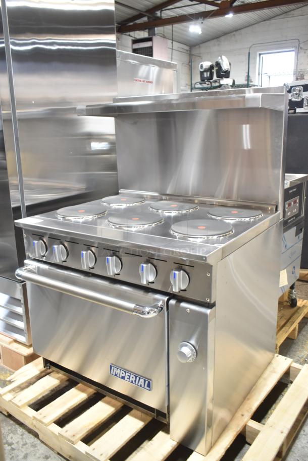 Brand new 2026 Imperial IR-6-E 6 burner electric range with oven, overshelf, and backsplash. 240V, 3 phase.