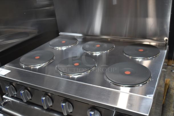 BRAND NEW Imperial IR-6-E electric 6 burner hot plate range with oven, over shelf, and back splash. 240V, 3-phase.