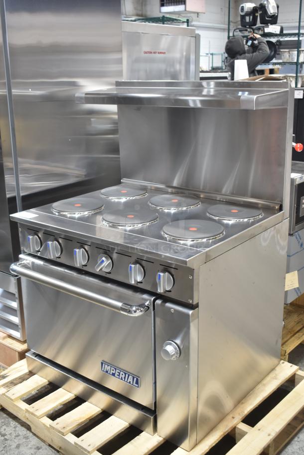 Brand new Imperial IR-6-E 6 burner electric range with oven, shelf, backsplash. Scratch/dent condition. 240V, 3 Phase.