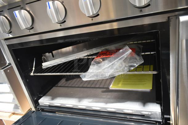 Brand new 2026 Imperial IR-6-E commercial electric range; 6 burners, oven, overshelf. Scratch and dent condition.