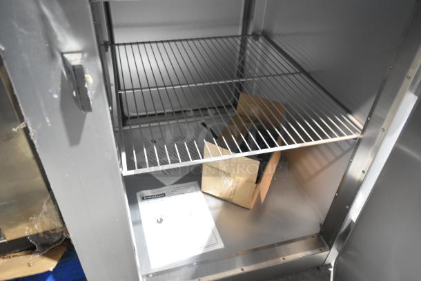 2022 Traulsen G10042-032 commercial cooler, 2 half-size doors, scratch and dent, includes commercial casters, 115V, 1-phase.