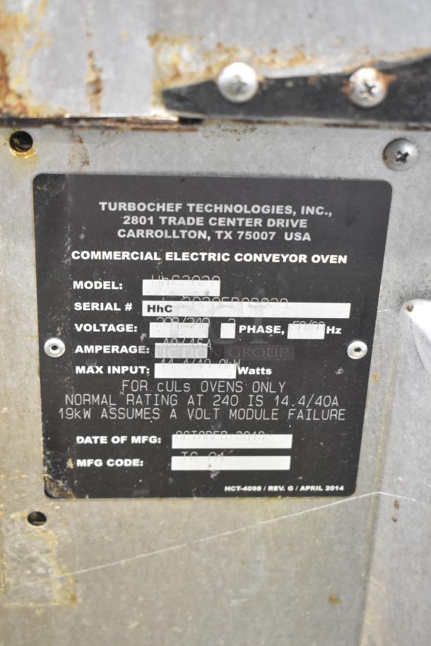 Turbochef HhC2020 electric conveyor oven label showing model, voltage 208/240, 3-phase, and manufacture date October 2018.