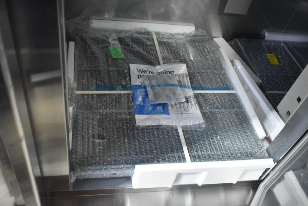 BRAND NEW SCRATCH AND DENT! 2025 Avantco 178SS3FHC Commercial 3 Door Reach In Cooler. Protective packaging visible inside.