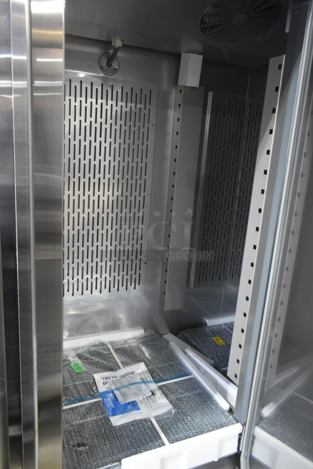 Brand new Avantco 178SS3FHC 3-Door Reach-In Cooler, scratch and dent model, interior view, 115V, 1 phase.