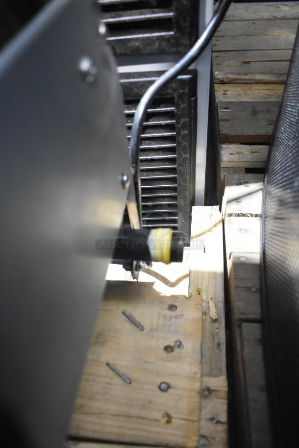 Close-up of the rear section of the 2025 Avantco 177CAG60MG griddle, showing connection ports and components.